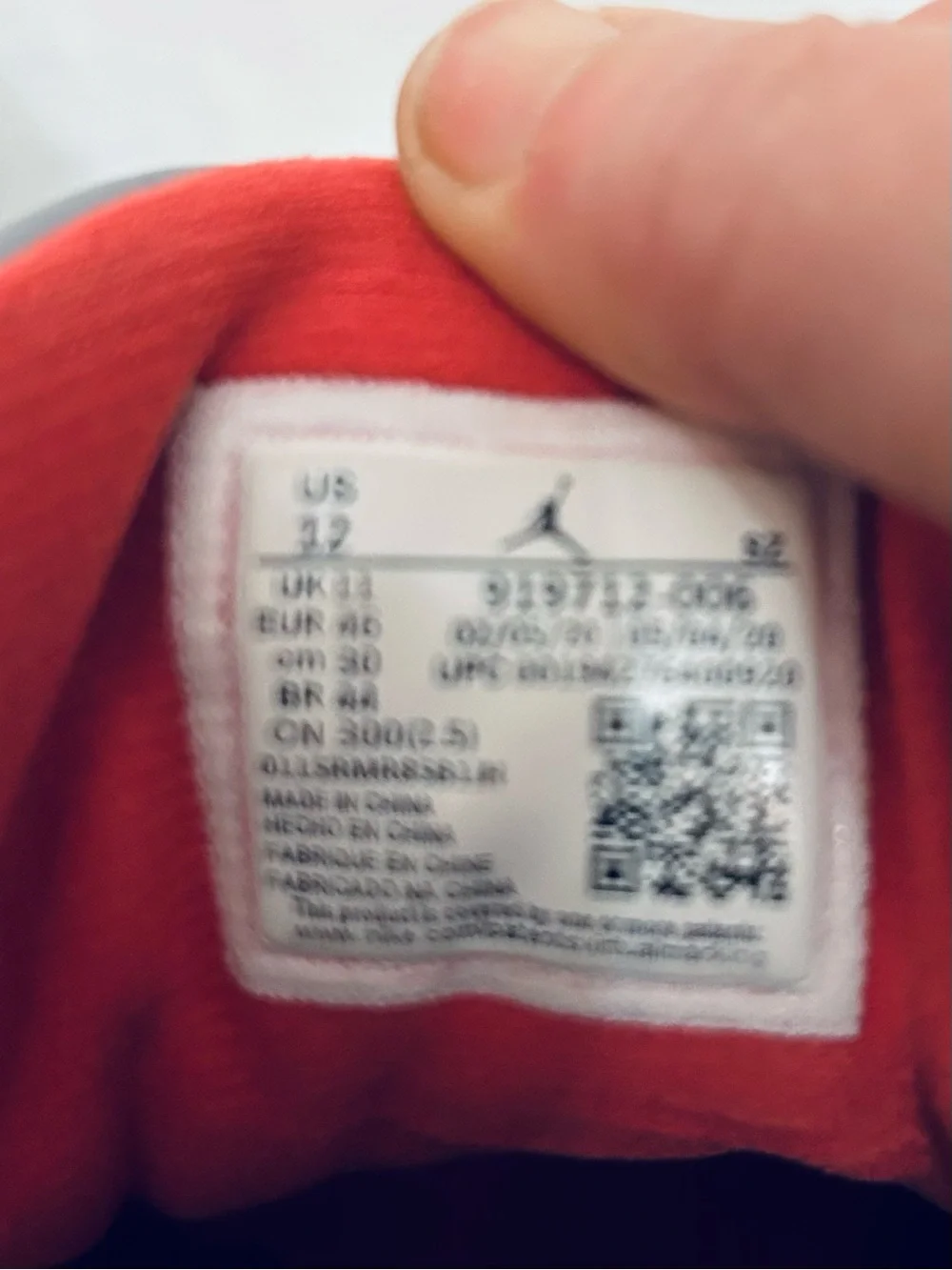 Air Jordan 11 Retro Low IE‎ Men's Black/Grey Sneakers with Red Jumpman Accents